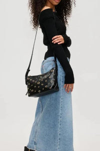 grommet crossbody bag