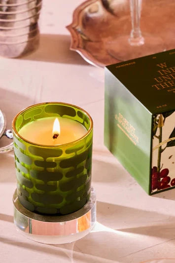 5.5oz candle under the tree