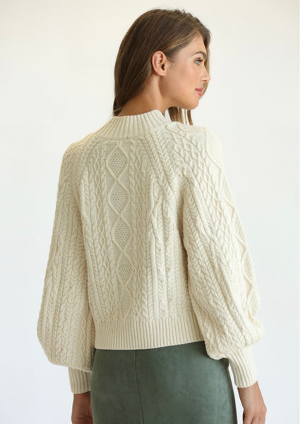 chunky pom cable sweater