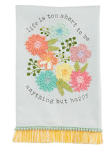 Load image into Gallery viewer, Cotton hand towel features embroidered floral bundle, printed sentiment and fringe or pom trim.
